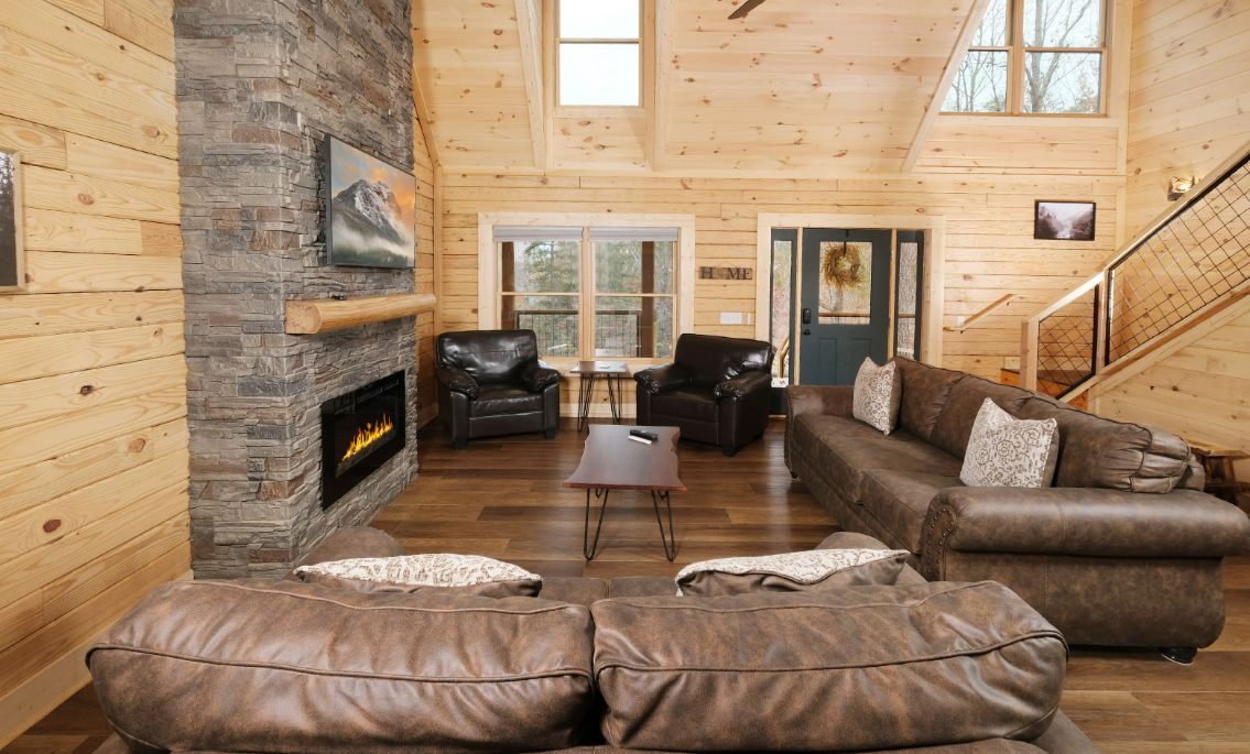 Living room with stone fireplace